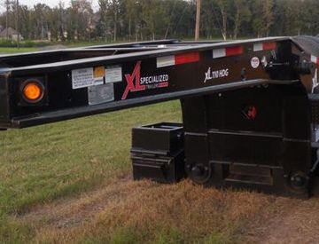 Moore Truck and Equipment Inventory:  XL Specialized Trailers Model 110HDG 3 Axle Lowboy w/4th Axle Flip